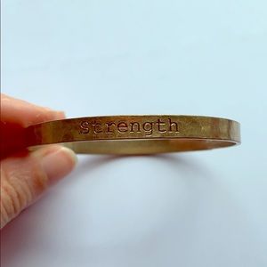 Altar’d State Gold toned “Strength” Bangle